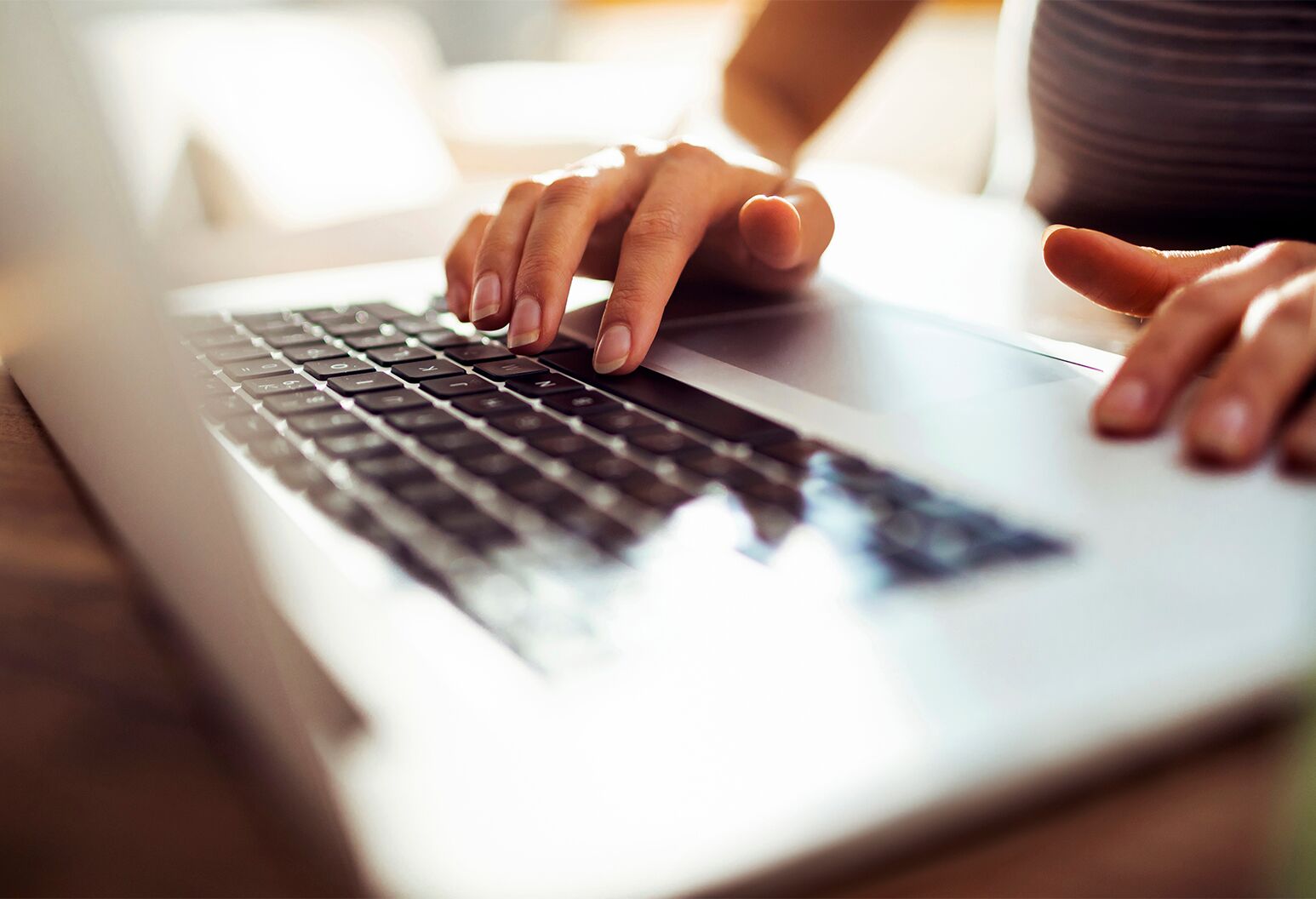 Close up of a young woman working from home.