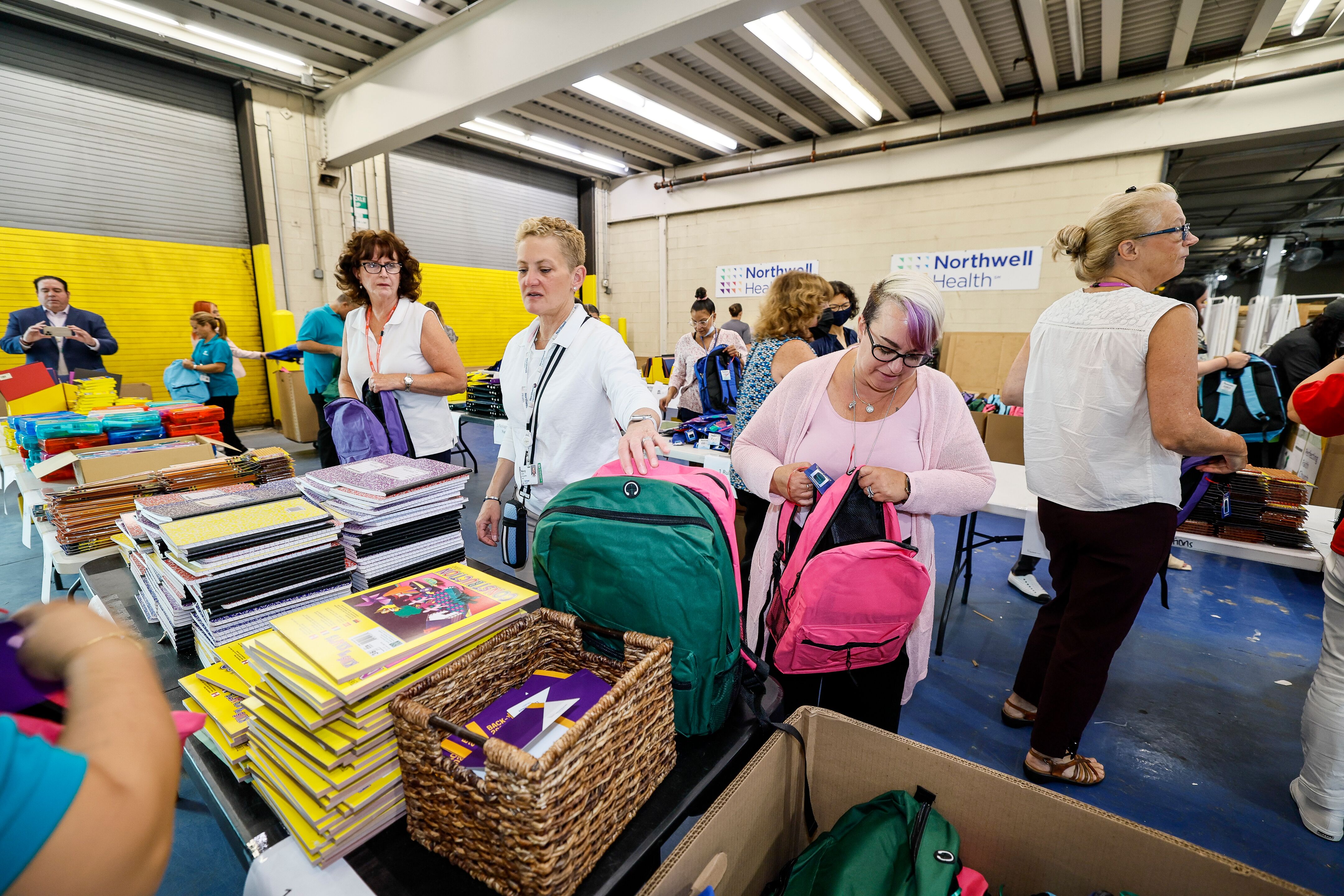 Northwell packs 2,000 book bags filled with essential school supplies