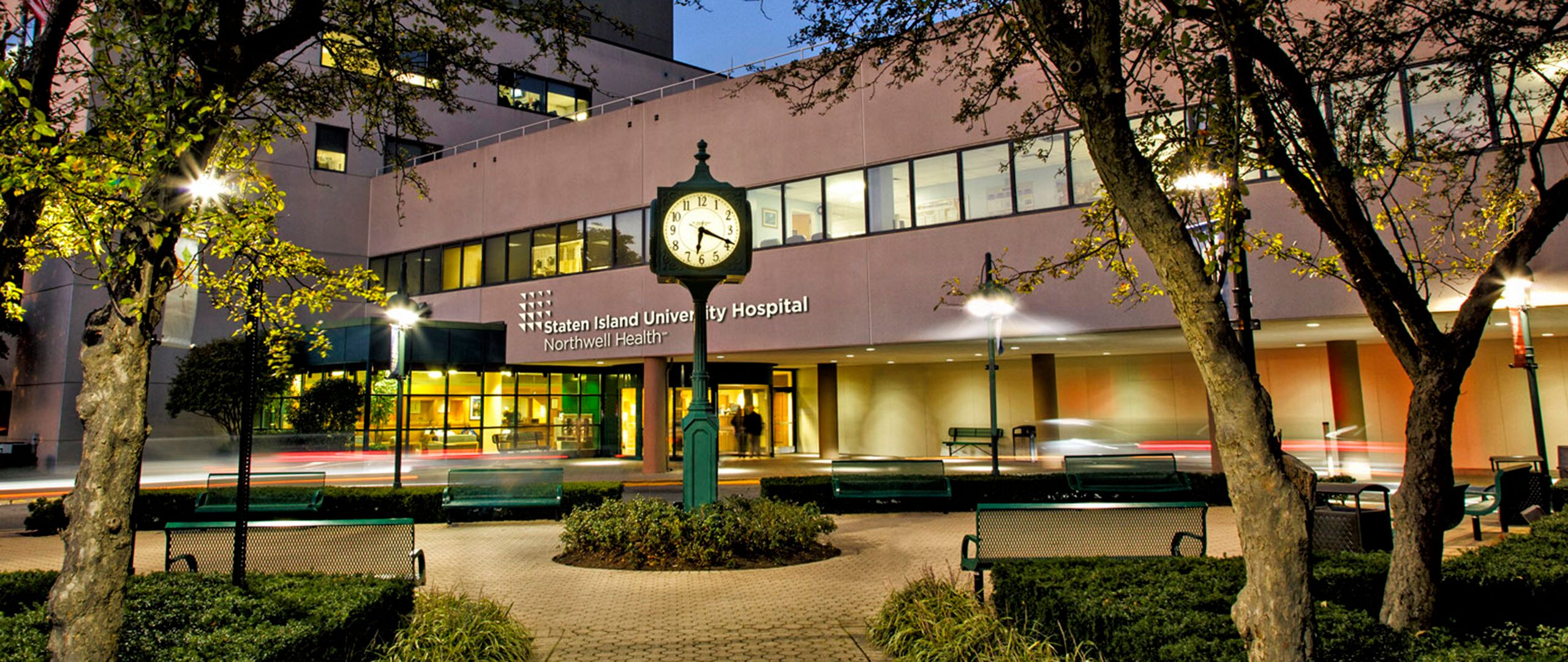 Outside the front of Staten Island University Hospital at dusk