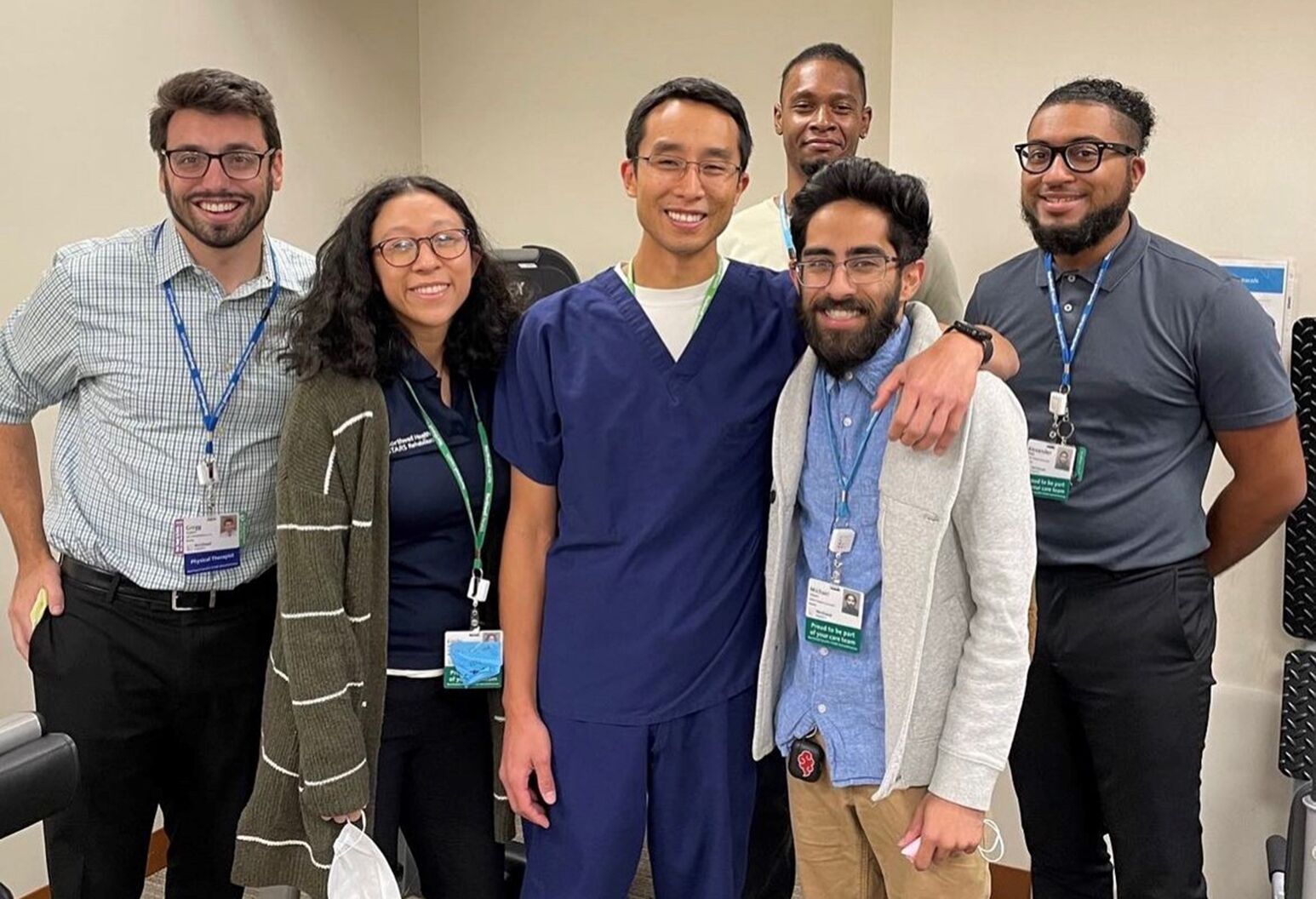 Group of Northwell employees standing together while smiling at the camera.