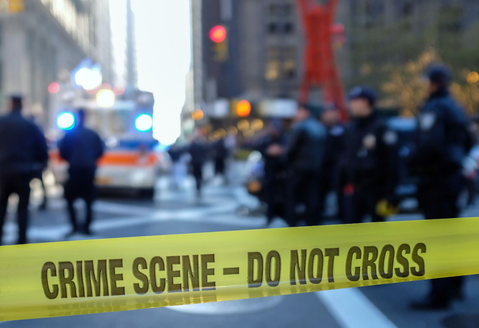 A crime scene with police tape.